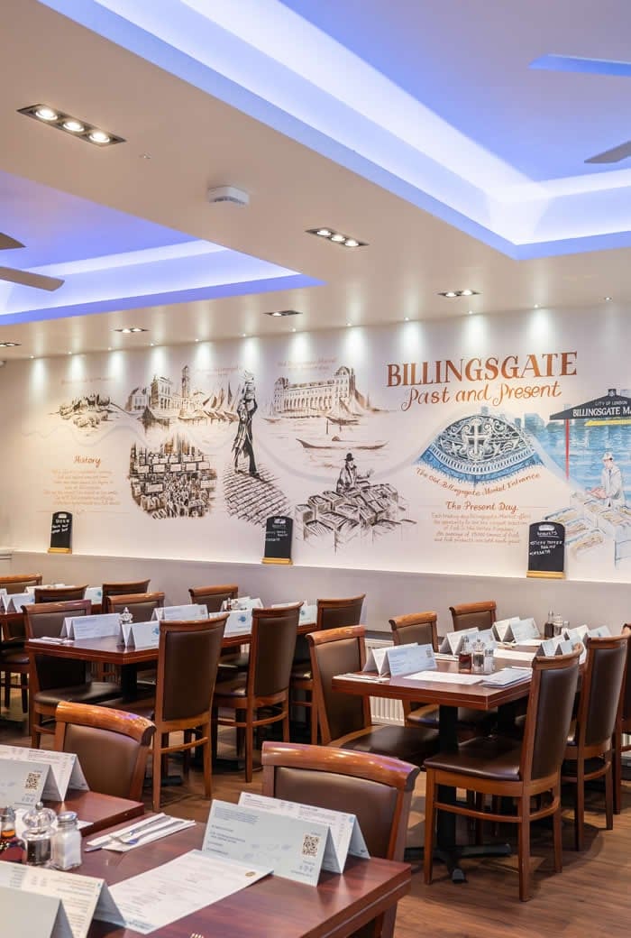 Sea Pebbles dining room with its hand-drawn Billingsgate market mural